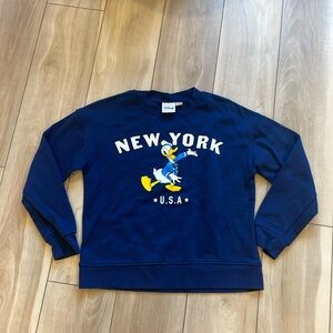 Women’s Disney Donald Duck crewneck sweatshirt. Size extra small. Size 2 to 4.